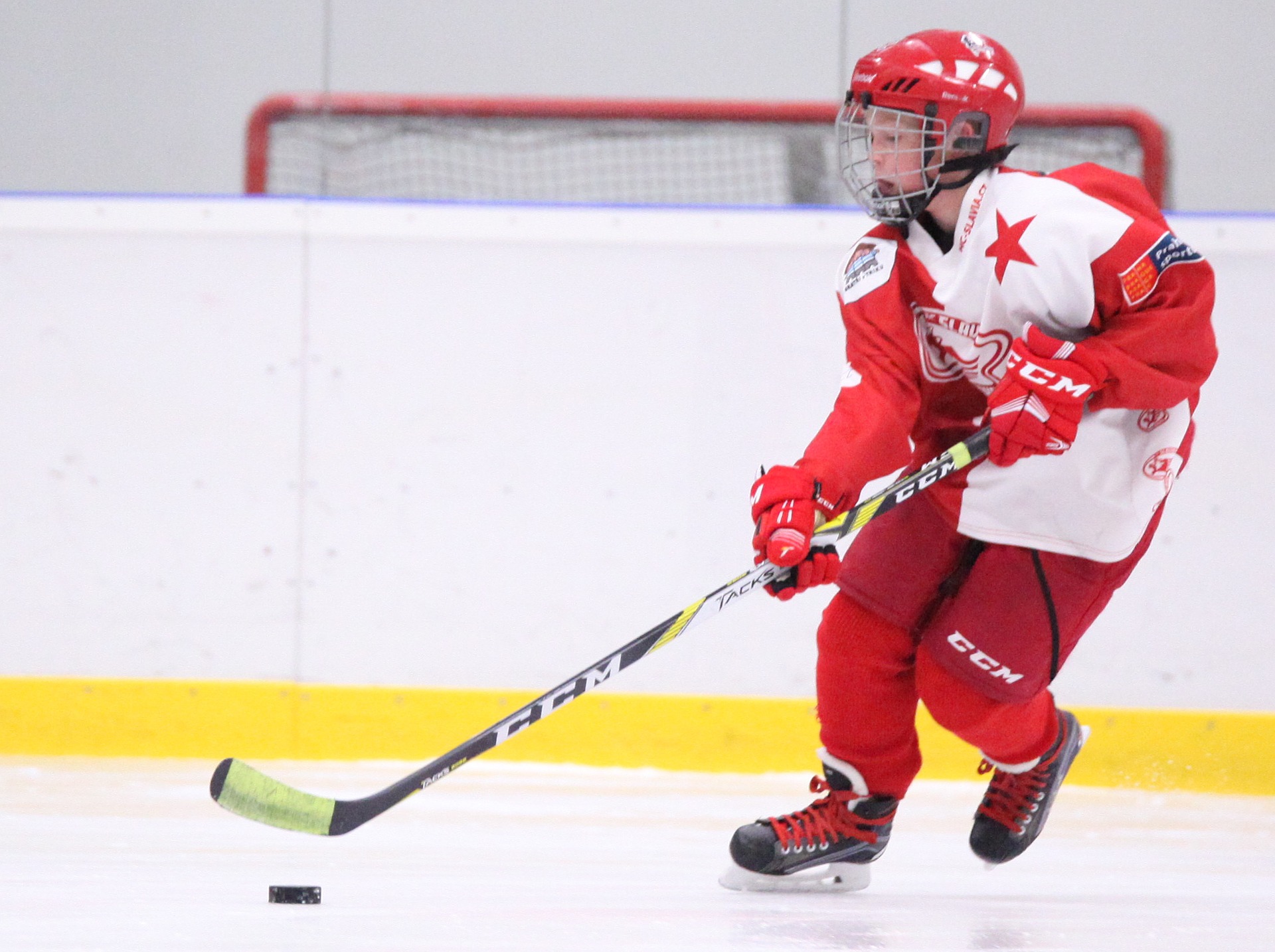 Kid playing hockey